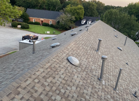 Photo of gray asphalt shingles on a commercial roof