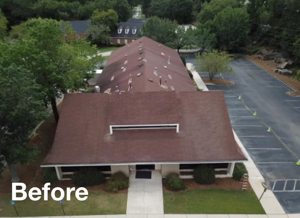 Photo of a brown asphalt commercial roof before roof replacement