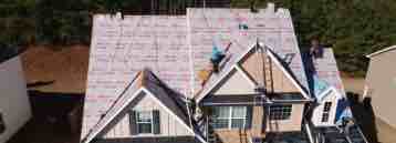 Image of a residential roof being repaired