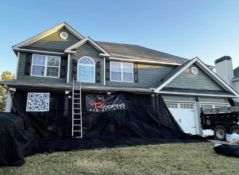 Image of roof repair service in Cumming in progress