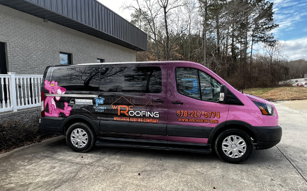 Image of a Whitaker Roofing Company vehicle