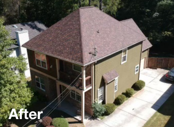 Photo of a brown asphalt residential roof after roof replacement