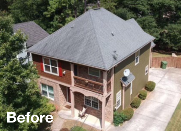 Photo of a grey asphalt residential roof before roof replacement