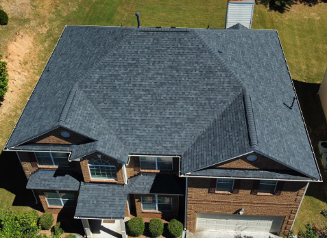 Image of a house with newly installed gray shingled roof in Kennesaw Alabama