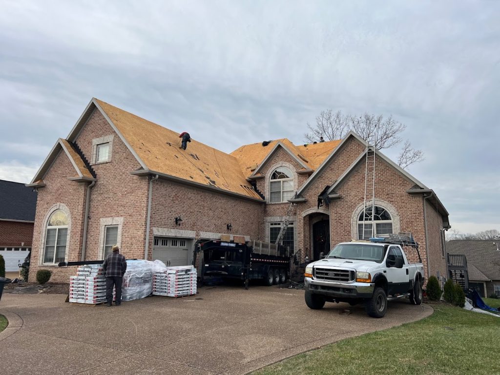 Photo of a Franklin brick home having its roof replaced