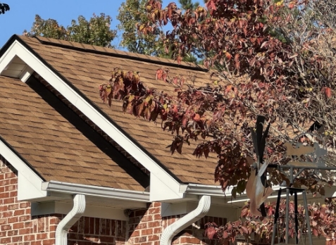 Up close image of a new gutter installed on a house