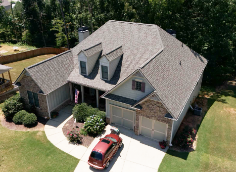 Image of a house with newly replaced gray shingled roof in Augusta Georgia