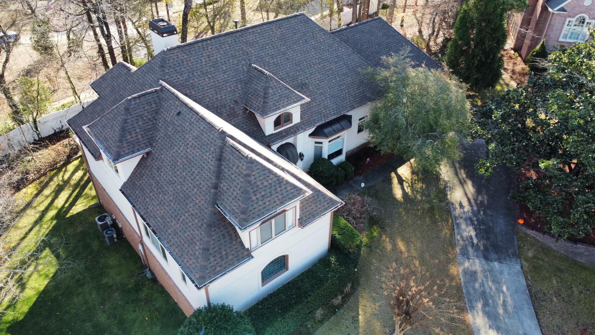 After a good roof quote, house is replaced with a new gray shingles