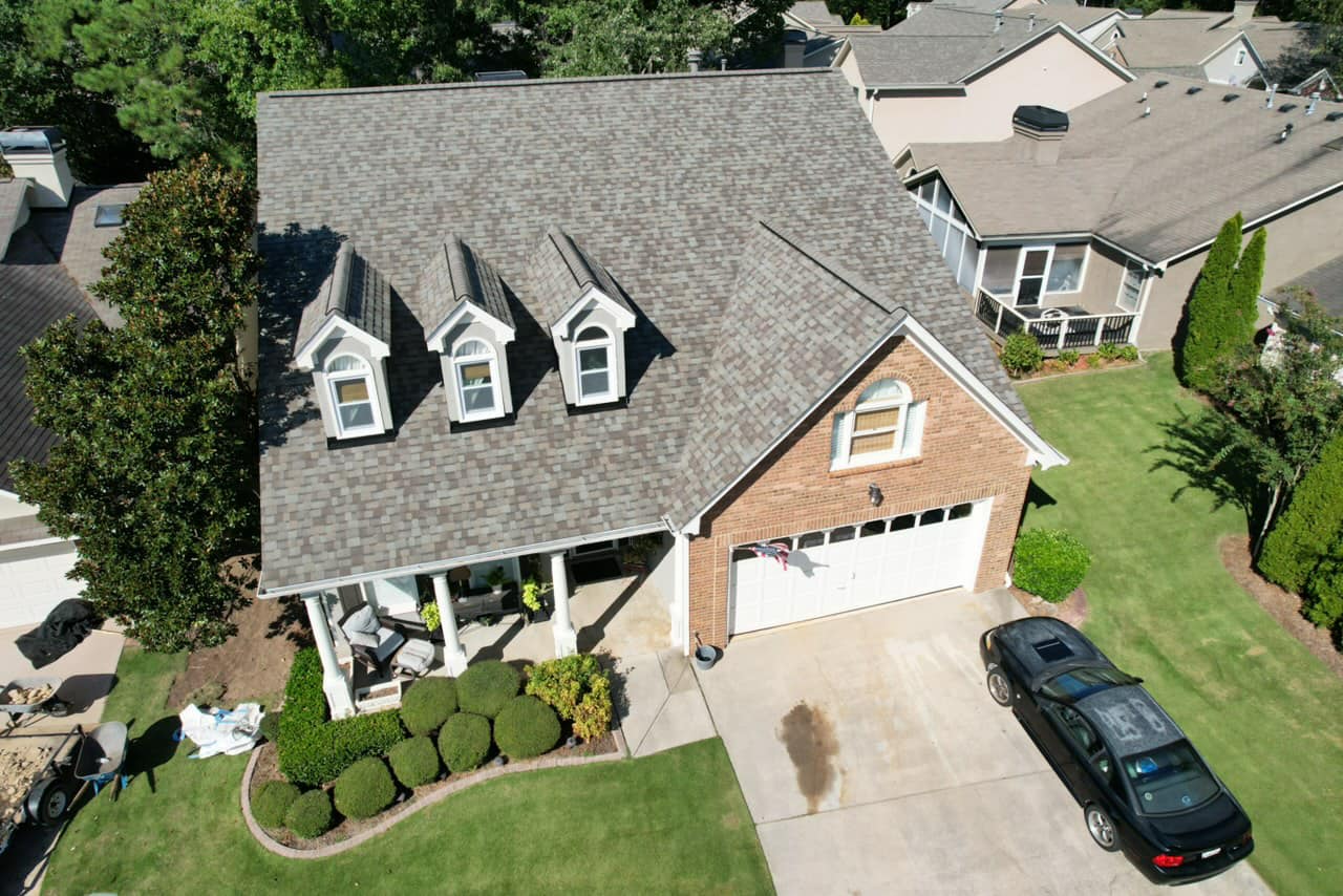 New gray shingles done after a roof quote