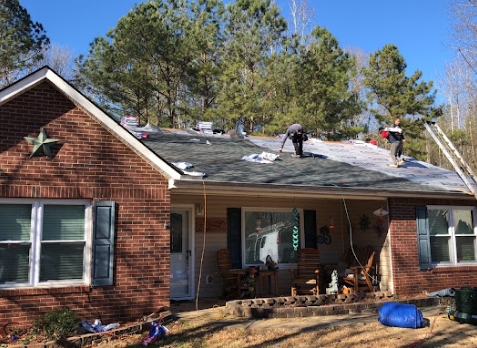 Image of a house with a roof being replaced in Sharpsburg Georgia