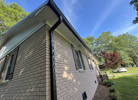 Image of new gutters on a house in Douglas