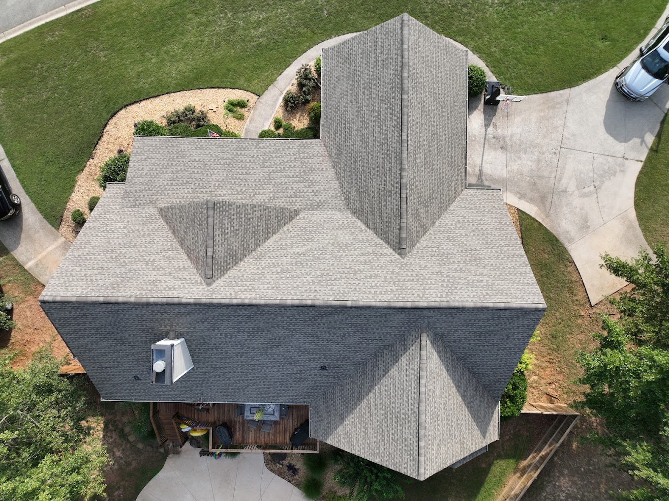 Top down view of a home with a brown quality roofing shingles