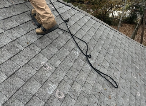 Image of a residential shingle roof during roof inspection