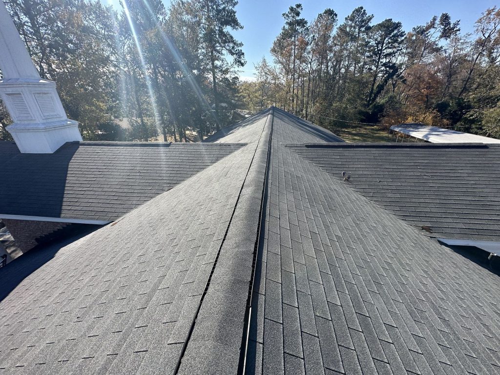 Image on top of a commercial shingle roof during commercial roof maintenance