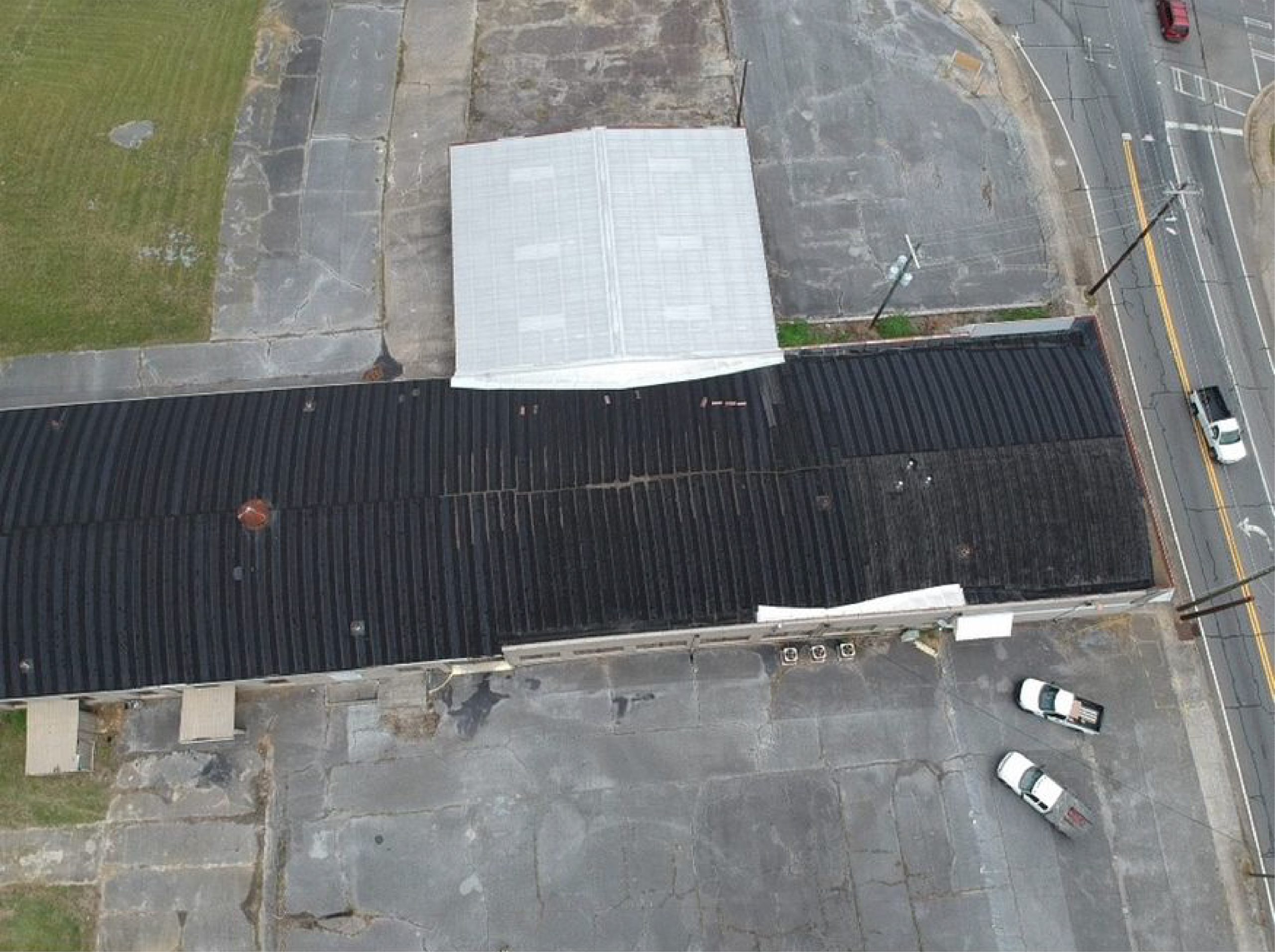 Overhead Image of a black metal roof during commercial roof maintenance