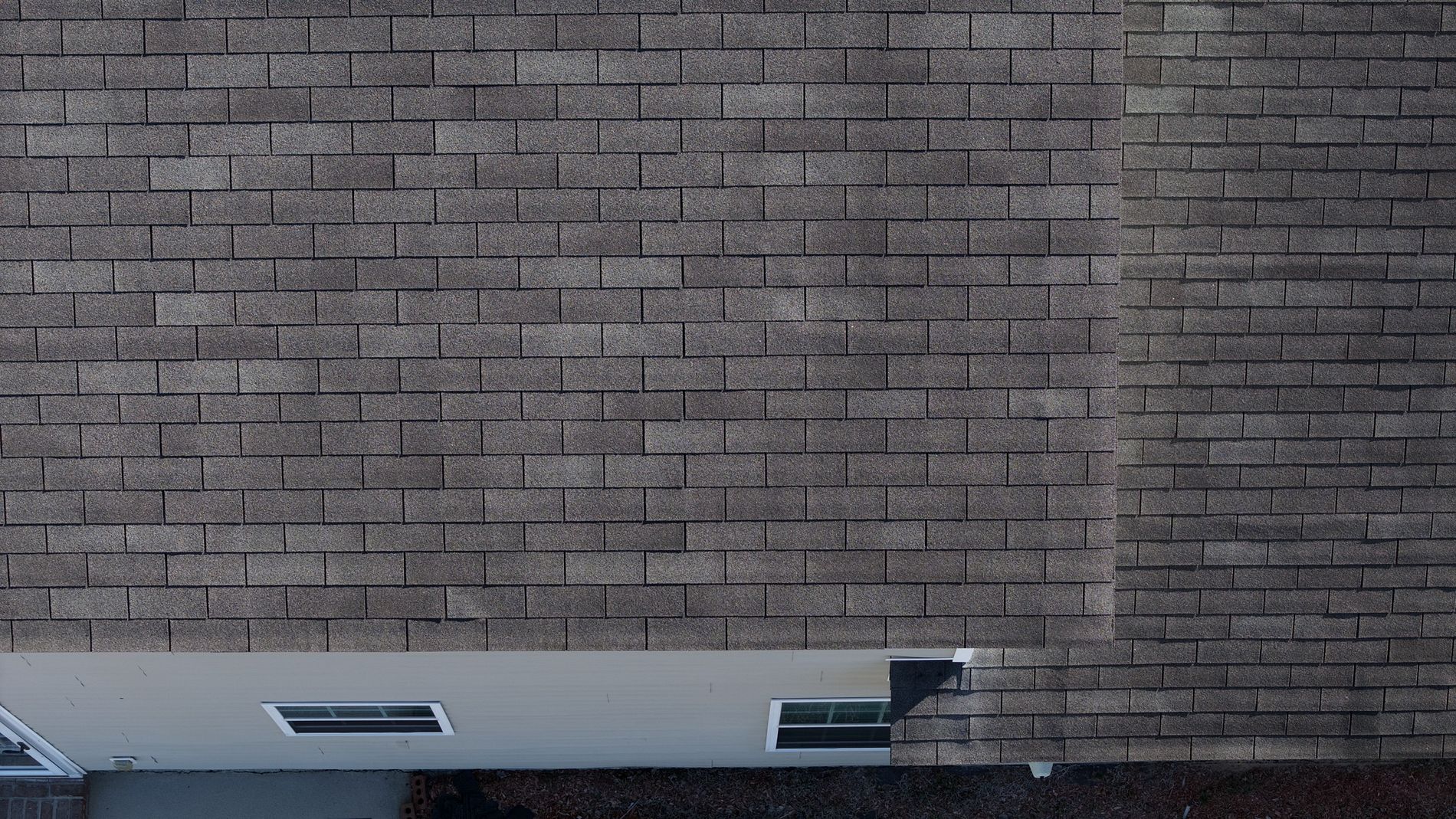 Closeup Image of a residential shingle roof during roof maintenance