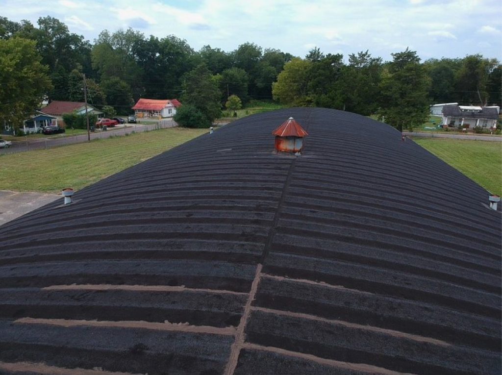 Image on top of a commercial metal roof during commercial roof maintenance