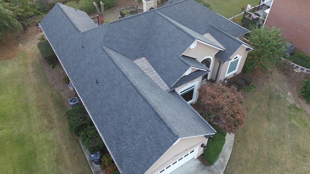 Top down view of a house with a shingle roof