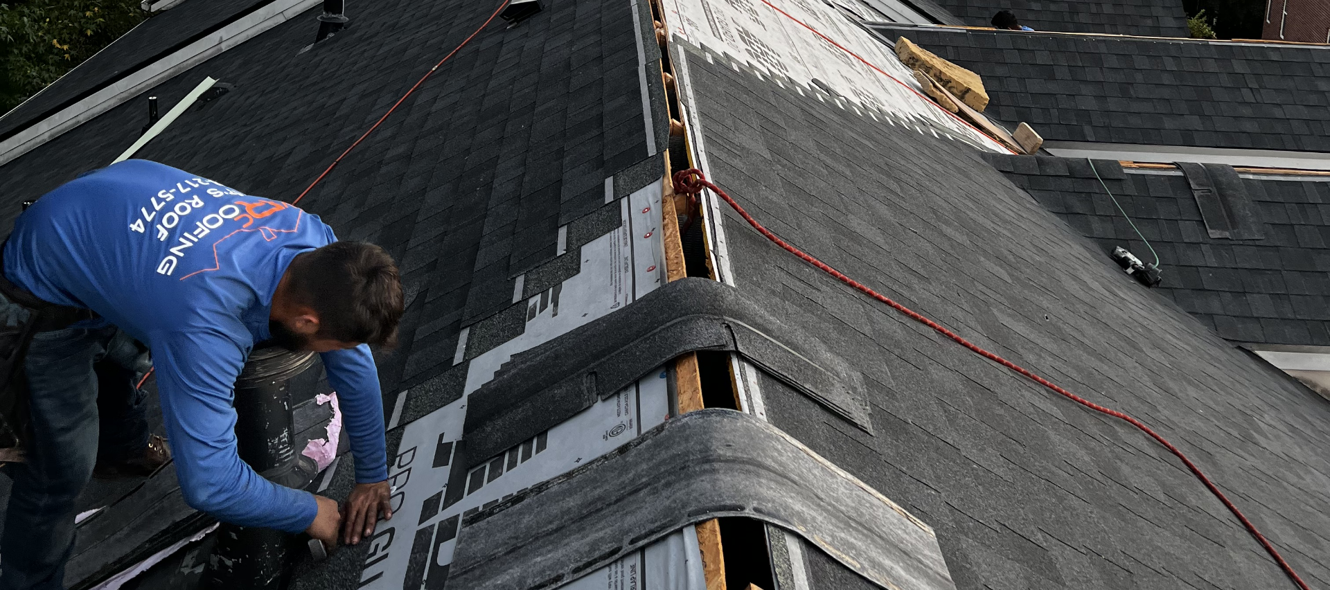 Overhead Image of a gray commercial shingle roof during commercial roof repair