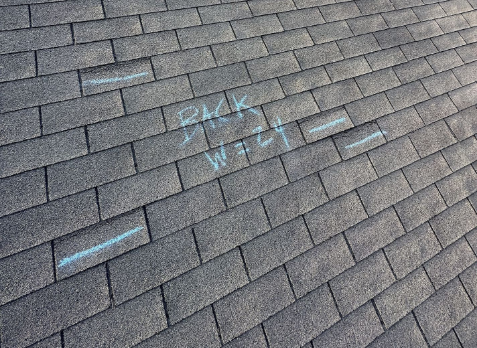 Image of a residential shingle roof during roof inspection