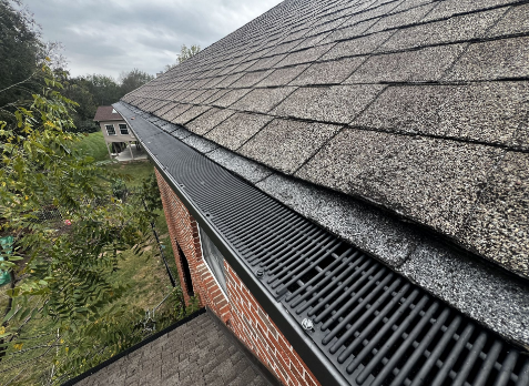 Image of a gutter installation on a house in Hendersonville