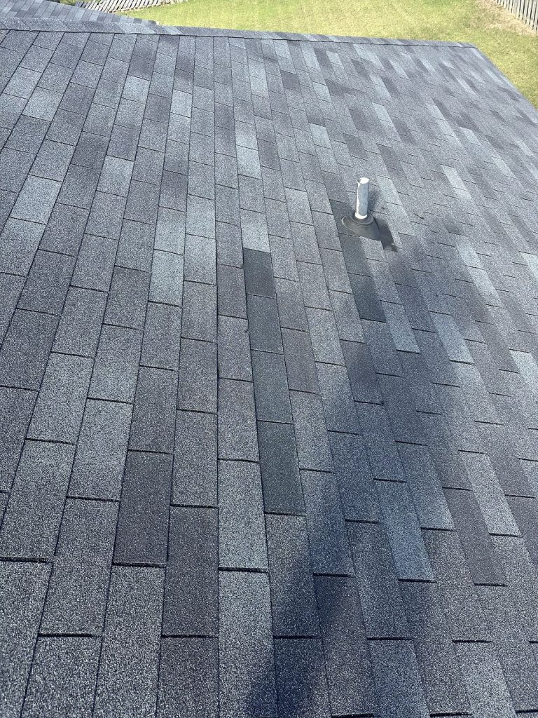 upclose image of a new gray shingles installed by a local roofing company