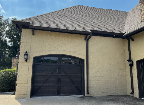 Up close image of a new gutter installed on a house