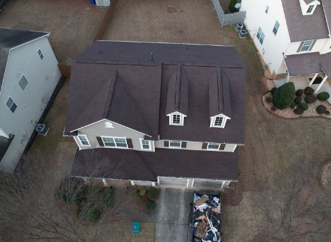 Image of a house with newly installed brown shingled roof in Villa Rica Georgia