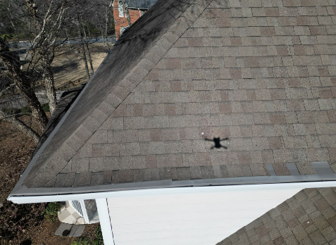 POV image of a drone inspecting a roof