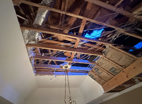 Upclose image of a residential roof in Villa Rica Georgia after storm damages