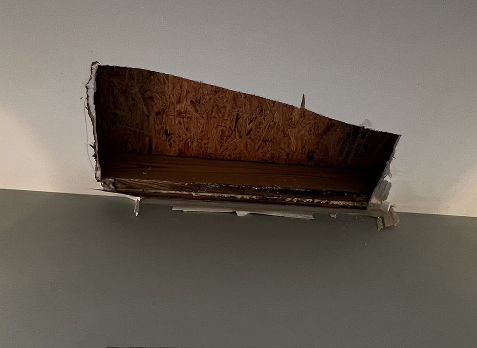 Upclose image inside a home showing storm damage on ceiling