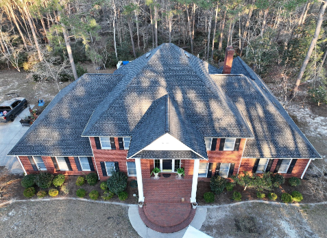 Image of residential house with a new gray shingle roof in Chelsea