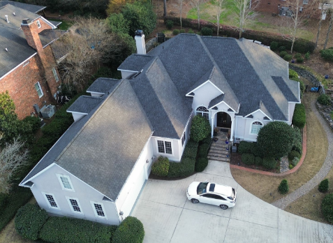 Image of residential house with a new gray shingle roof in Dallas Georgia