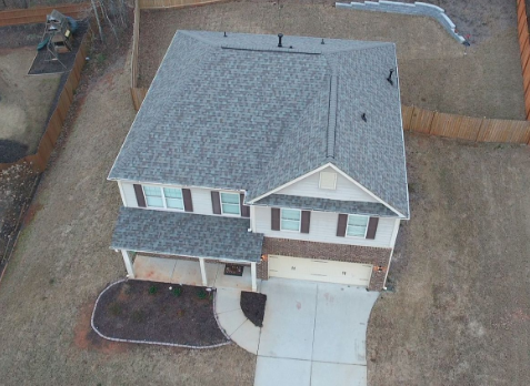 Drone Image of a house with newly installed gray shingled roof