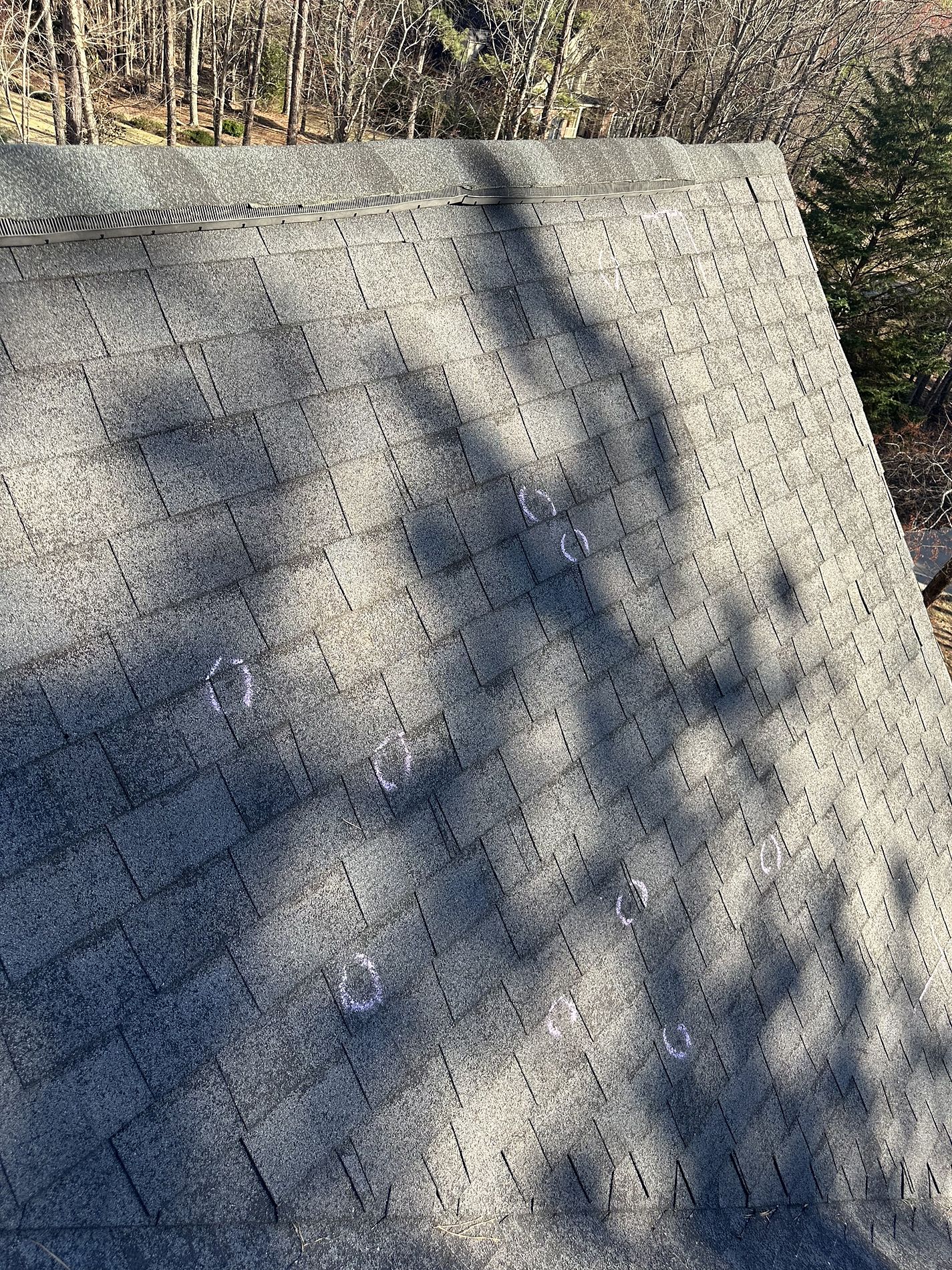 Photo of roof inspection a roof after hail storm