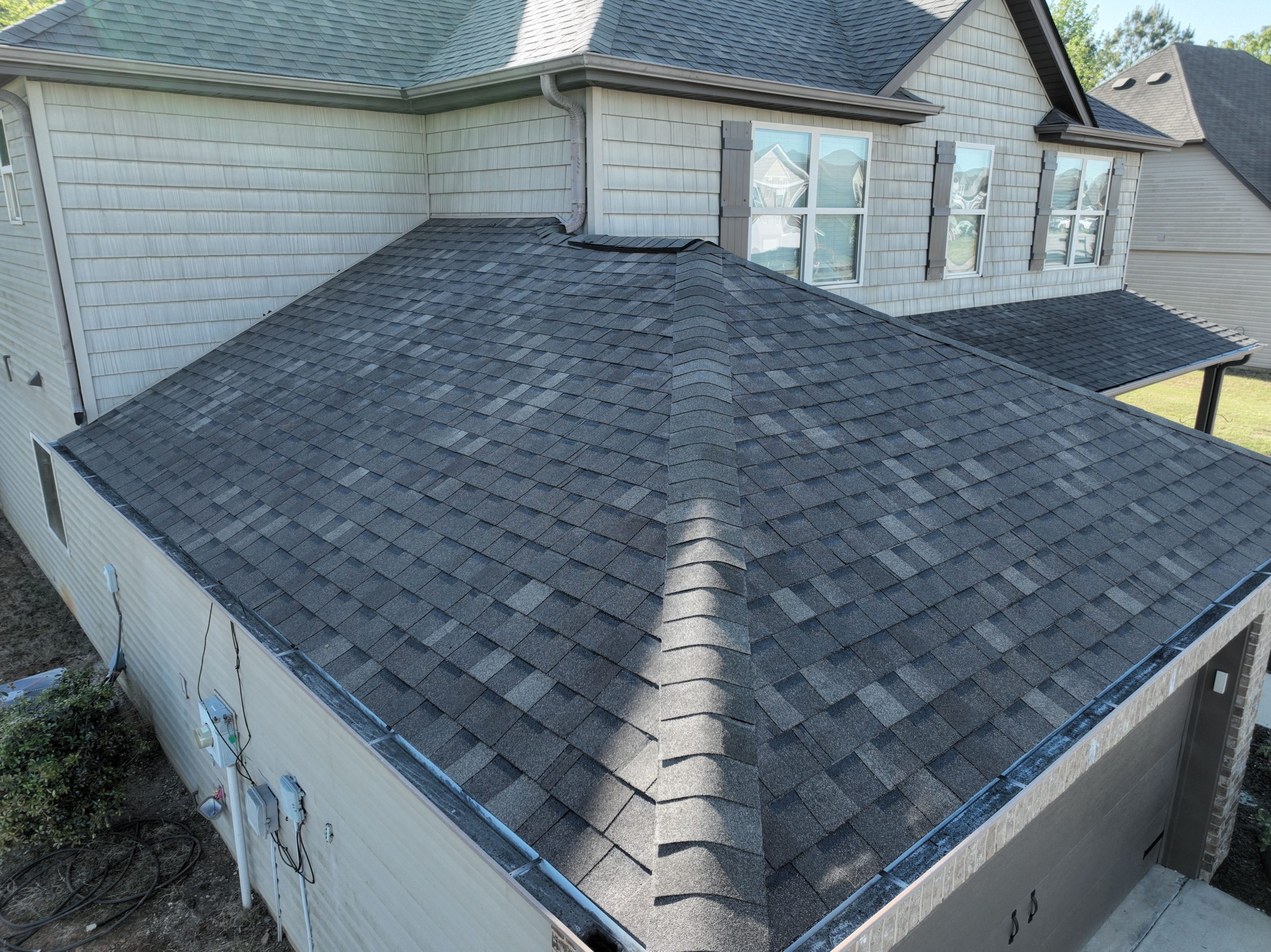 upclose image of roof with newly installed asphalt shingles