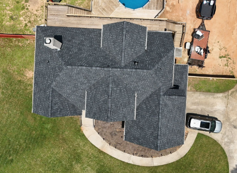 Image of a house with newly installed shingled roofing in Acworth.