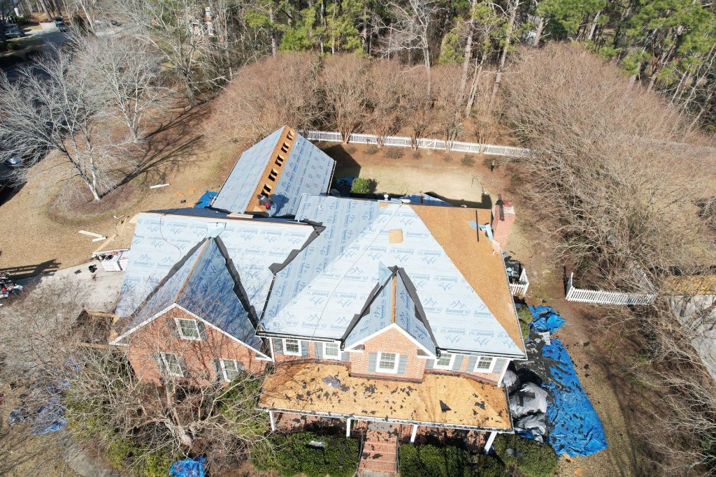 Drone Image of a house with during a roof replacement