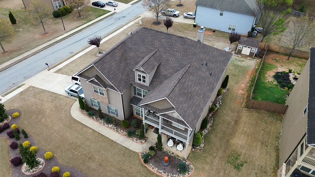 Drone Image of a house with newly installed gray shingled roof