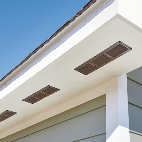 Photo of the side of a roof looking up at the soffit vents.