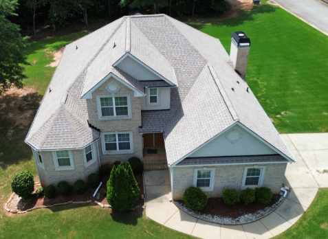 Drone Image of a house with newly installed light gray shingled roof