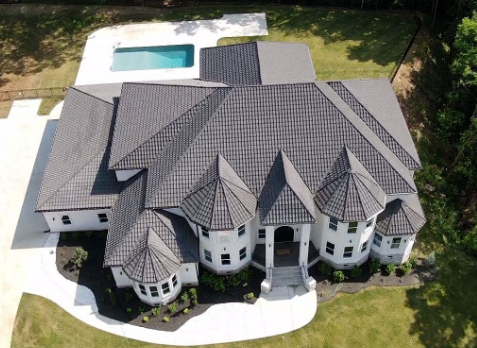 Drone Image of a house with newly installed light gray shingled roof.