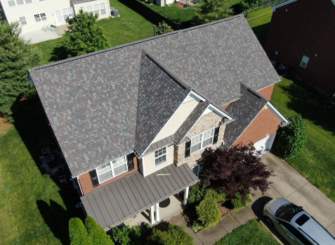 Drone Image of a house with newly installed light gray shingled roof.