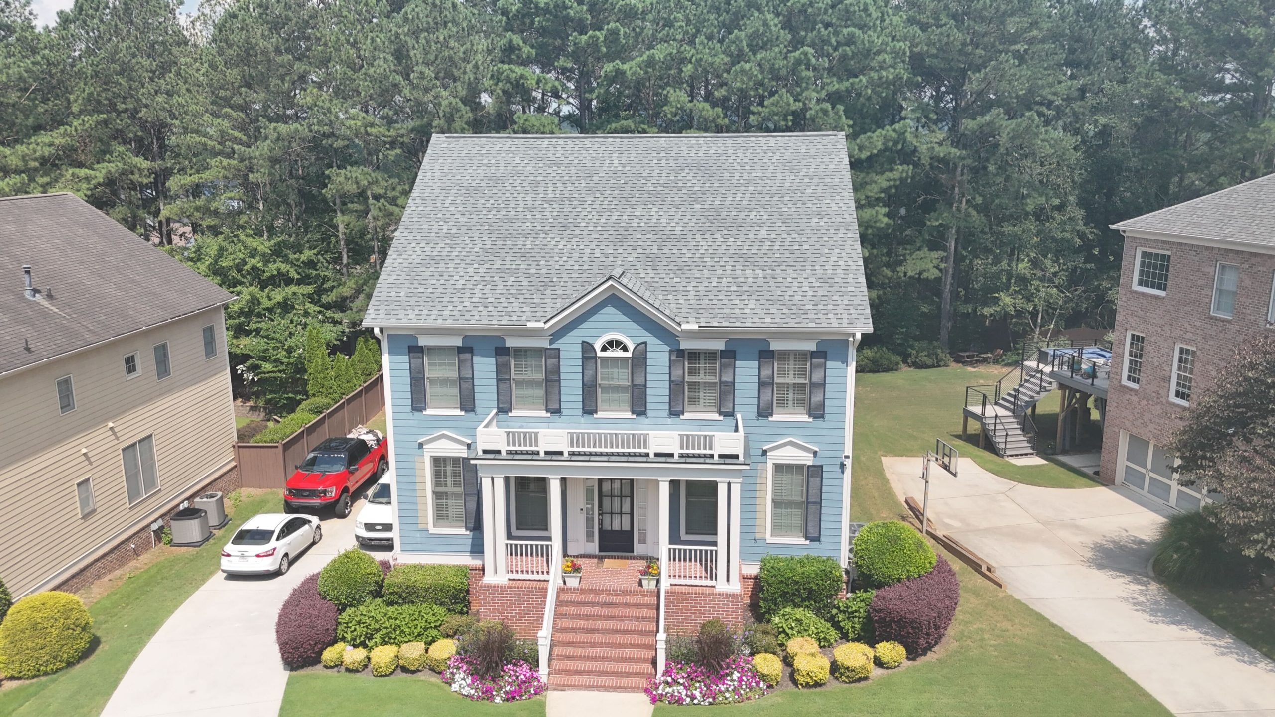 Photo of a house with gray Atlas shingles