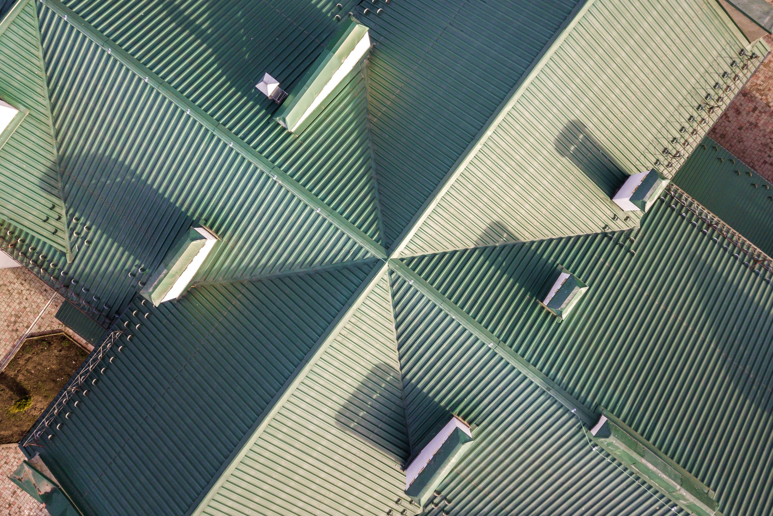 Overhead Image of a metal roof after a green metal roof coating