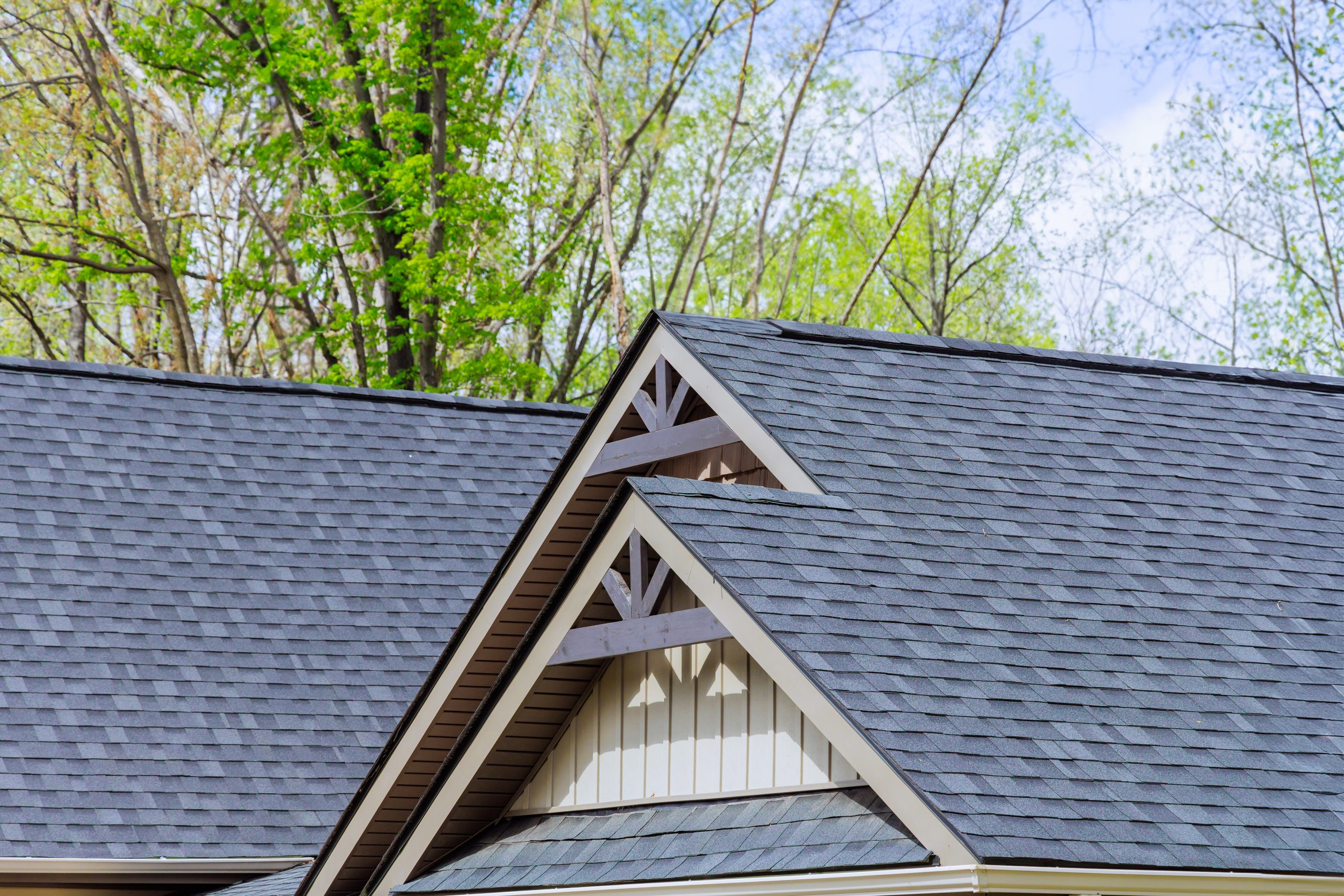 Architectural shingles cover roof top of newly constructed house