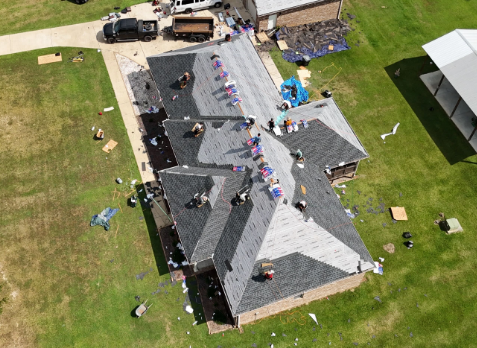 Top down drone image of a roof replacement in progress by the top rated roofing contractor