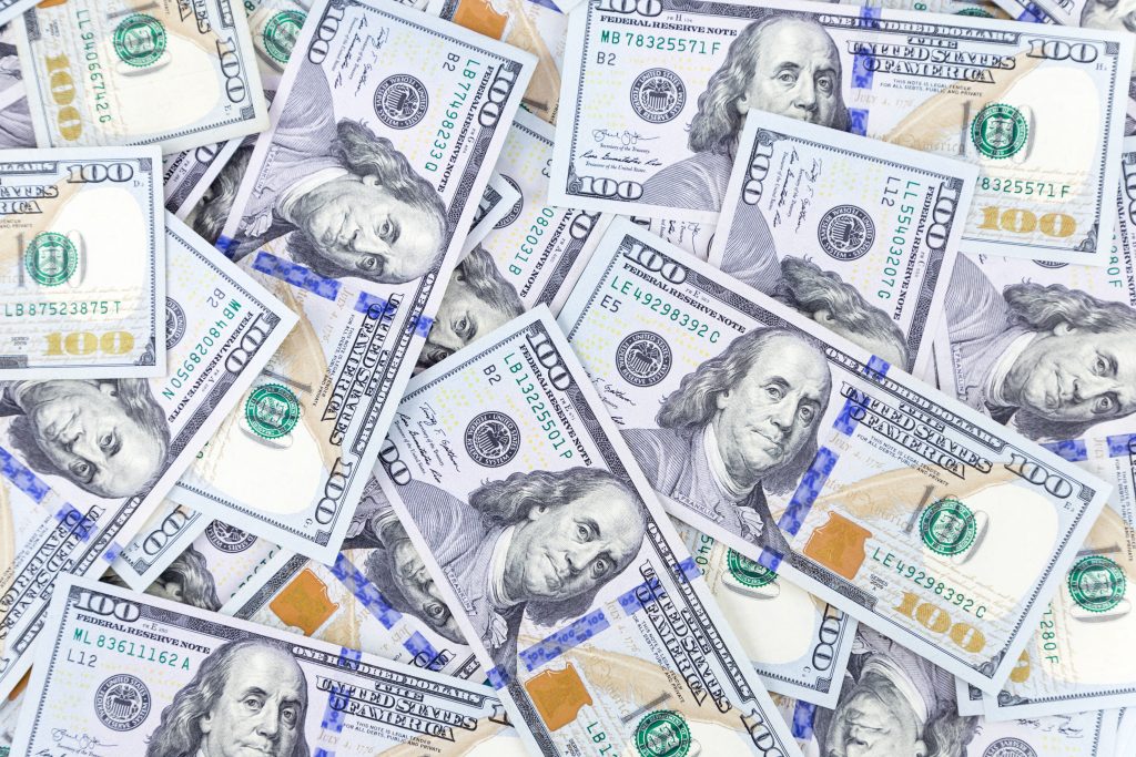 Image of 100 dollar bills for roof finanching