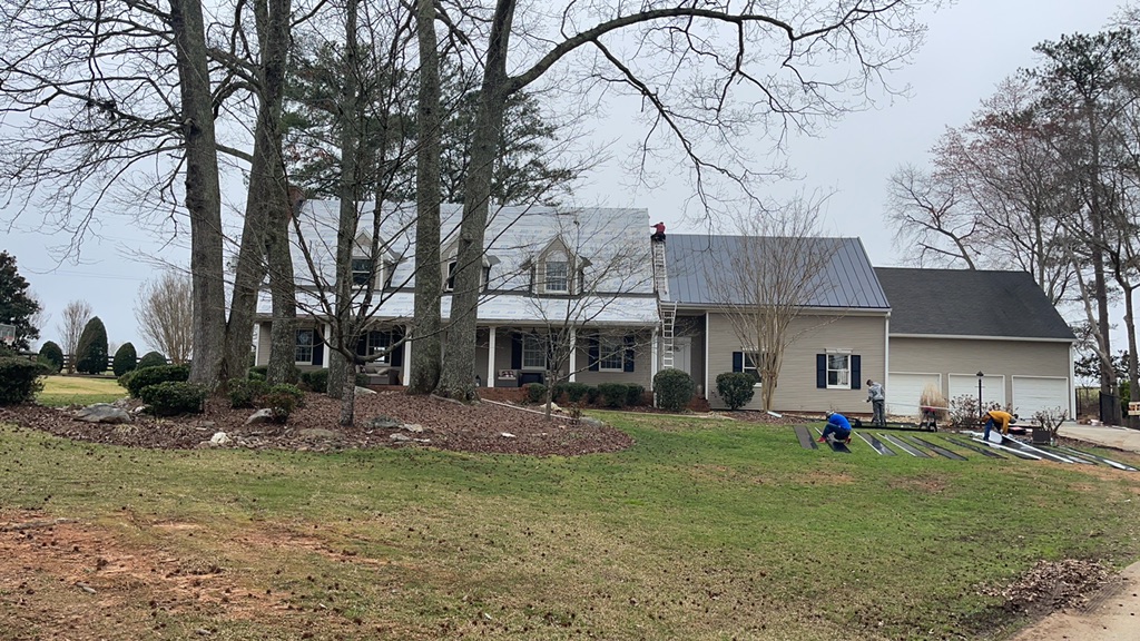 House during a metal roof replacement