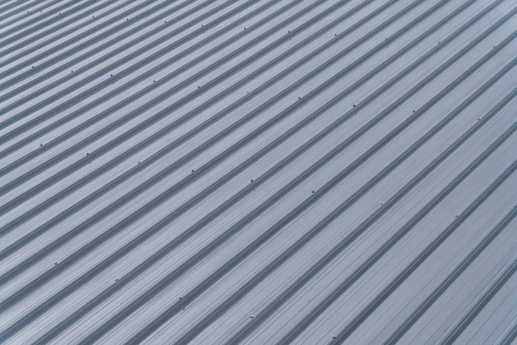 Image closeup view of a gray metal roof